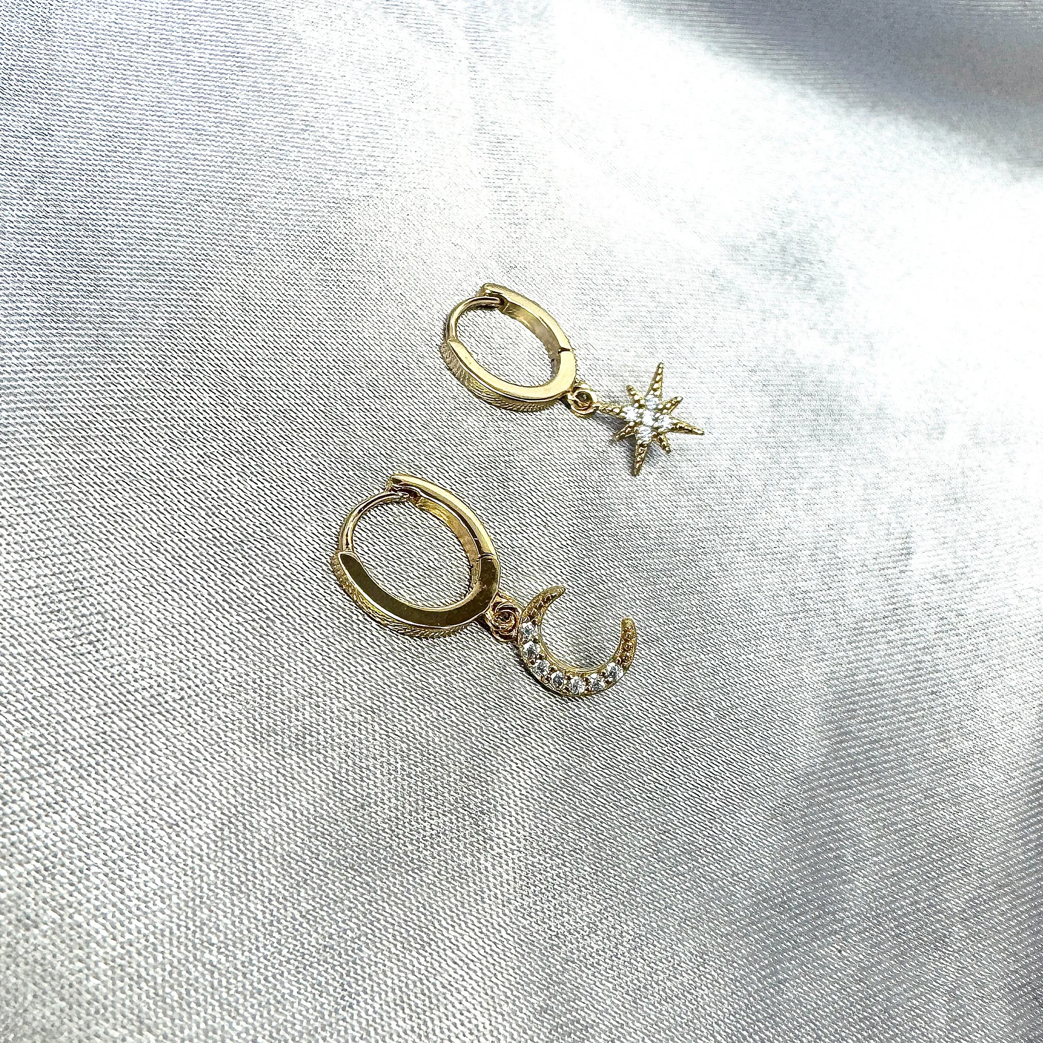 Five and Two Chloe Huggie Hoop Star Moon Charm Earrings in 14k Gold Plated